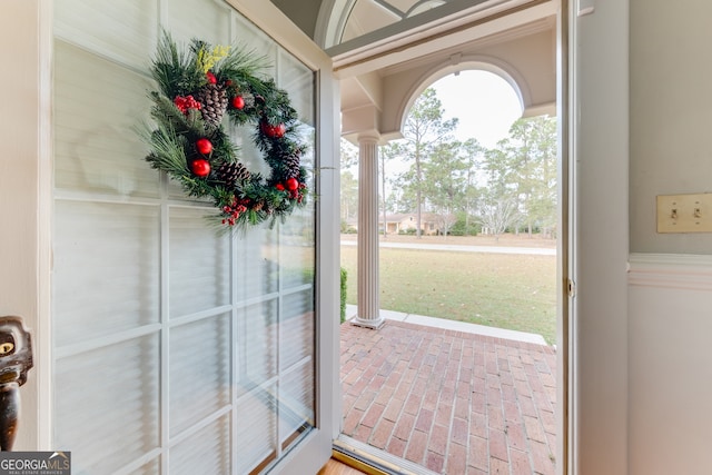 entryway with decorative columns