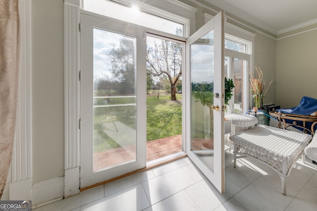 doorway to outside with light tile patterned floors and ornamental molding