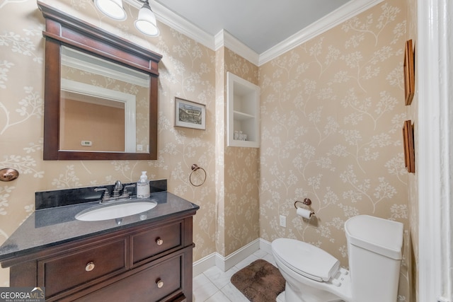 bathroom featuring tile patterned floors, vanity, toilet, and crown molding