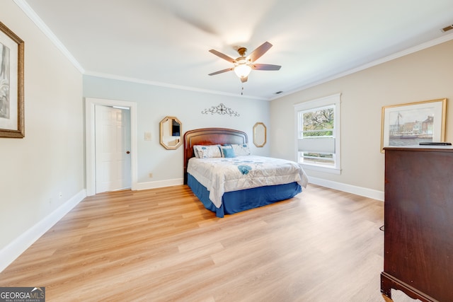 bedroom with ceiling fan, light hardwood / wood-style floors, and ornamental molding