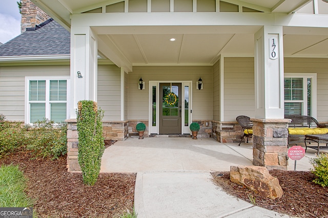 property entrance with a porch