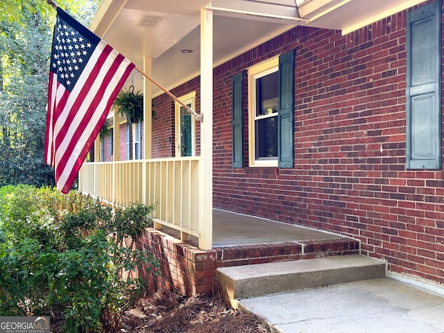 exterior space featuring covered porch