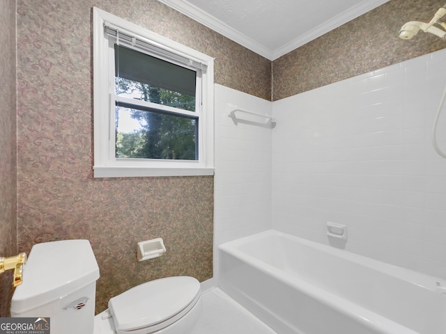 bathroom with toilet, shower / bathtub combination, and ornamental molding