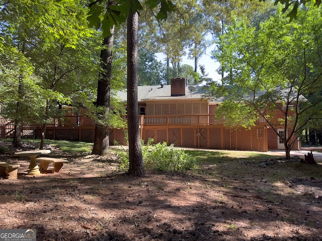 view of yard featuring a deck