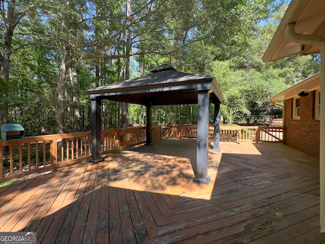 wooden deck with a gazebo