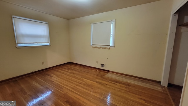 unfurnished bedroom featuring hardwood / wood-style floors