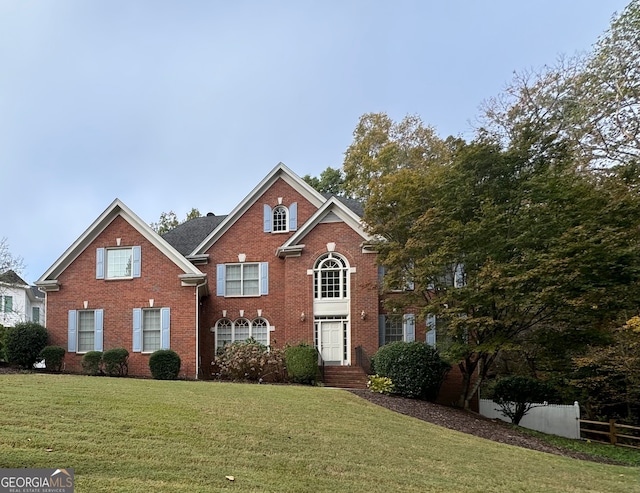 view of front property with a front lawn