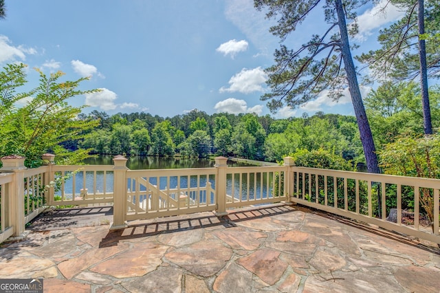 view of patio / terrace featuring a water view