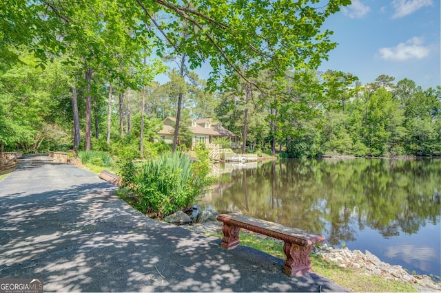 view of home's community featuring a water view