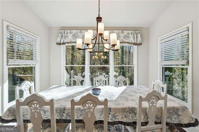 dining room with an inviting chandelier