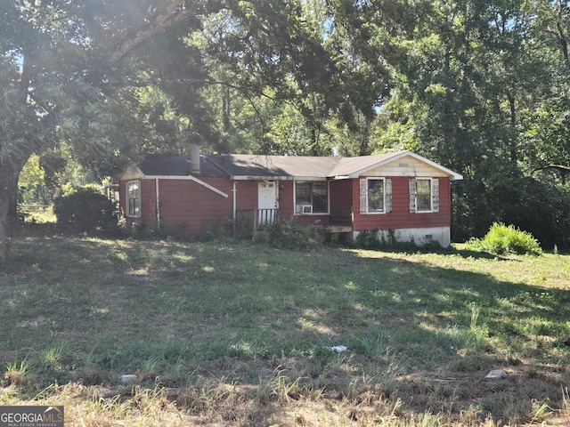 ranch-style house with a front yard