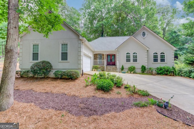 view of front of house featuring a garage and french doors