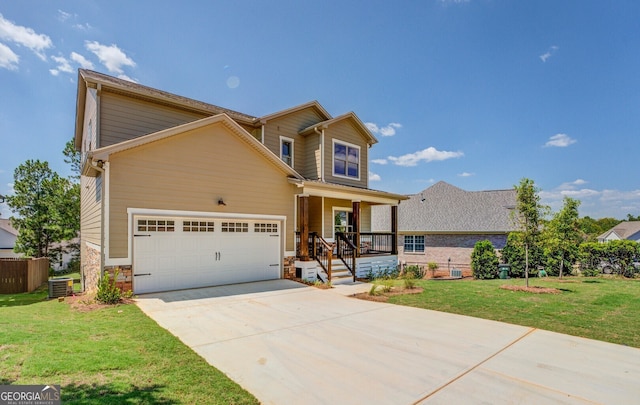 view of front of home with a front yard, cooling unit, a porch, and a garage