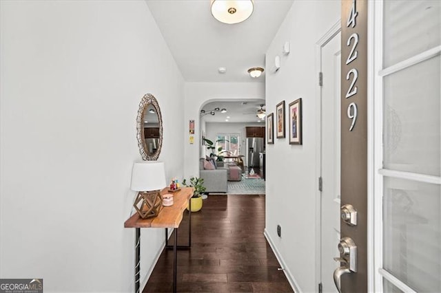 corridor with dark wood-type flooring