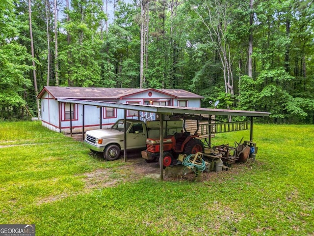 view of yard featuring a carport