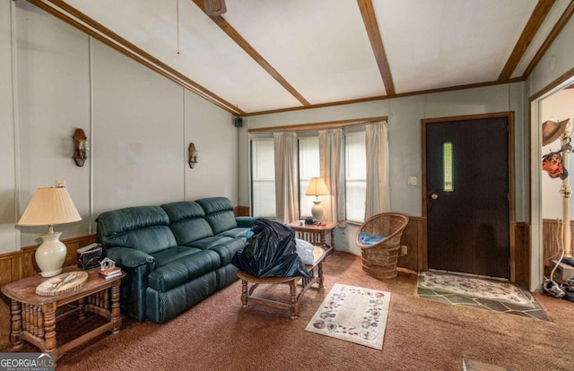 living room with carpet flooring, crown molding, wooden walls, and vaulted ceiling