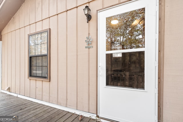 doorway to property featuring a deck