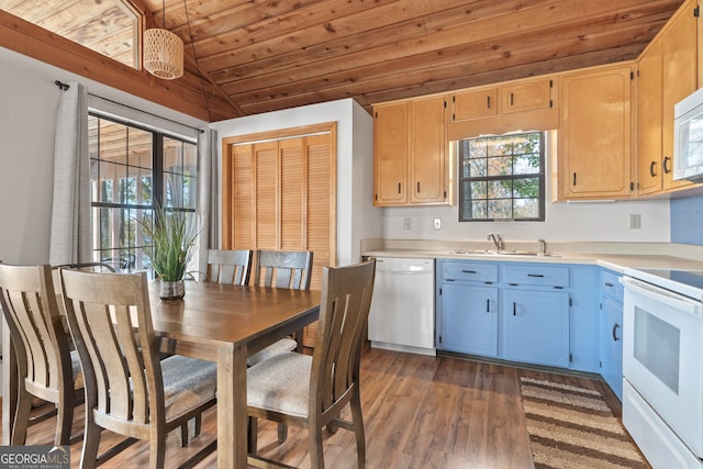 kitchen featuring sink, dark hardwood / wood-style flooring, decorative light fixtures, white appliances, and wood ceiling