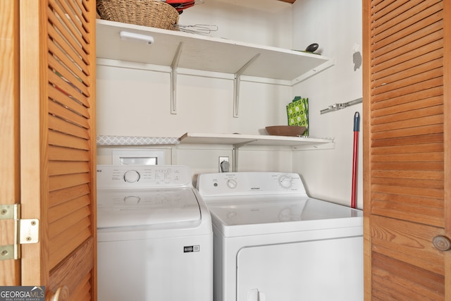 laundry area with washer and dryer