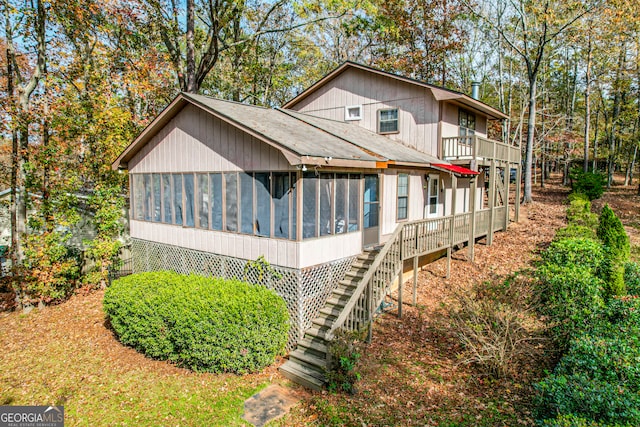 exterior space with a sunroom