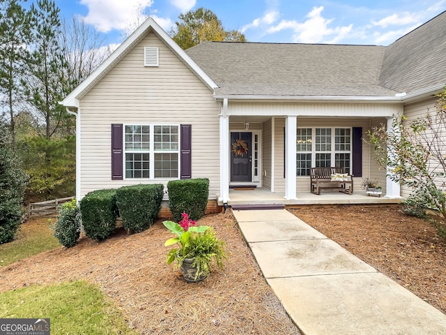 view of front of property featuring covered porch