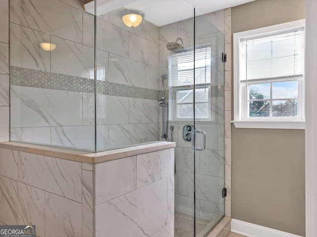 bathroom with an enclosed shower