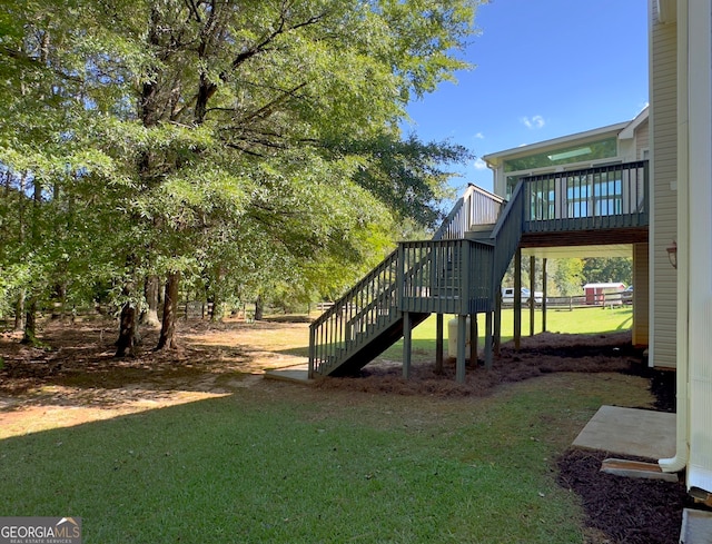 view of yard featuring a deck