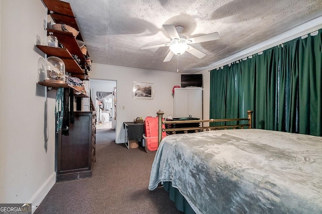 carpeted bedroom featuring ceiling fan and a textured ceiling