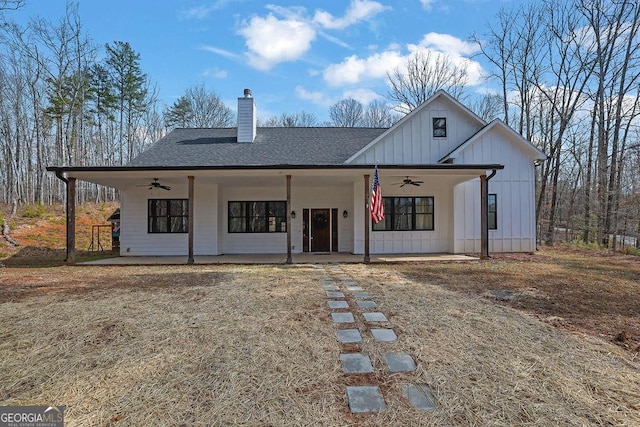 modern farmhouse with covered porch and ceiling fan