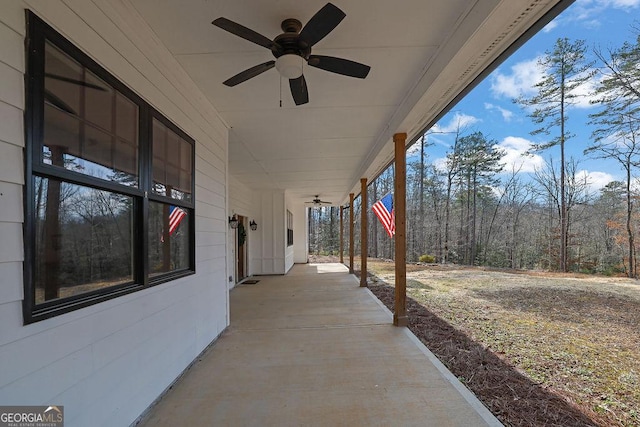 view of patio / terrace featuring ceiling fan