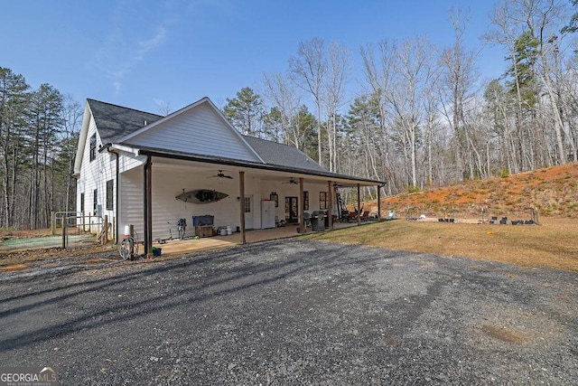 view of home's exterior with ceiling fan