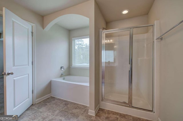 bathroom with independent shower and bath