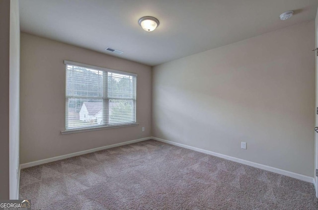 empty room with light carpet