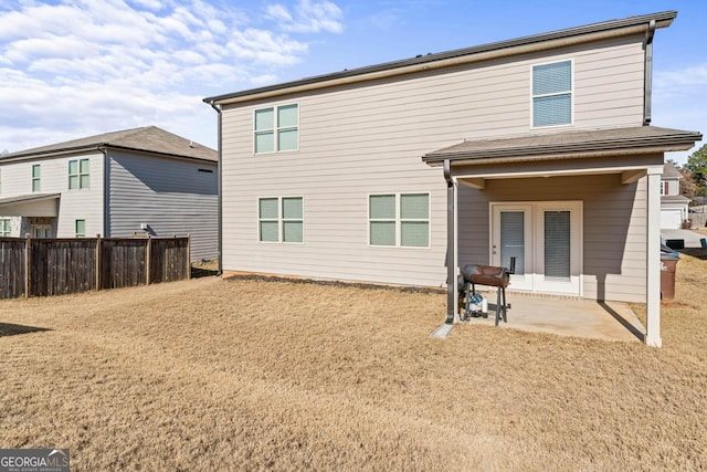 back of property with a patio area