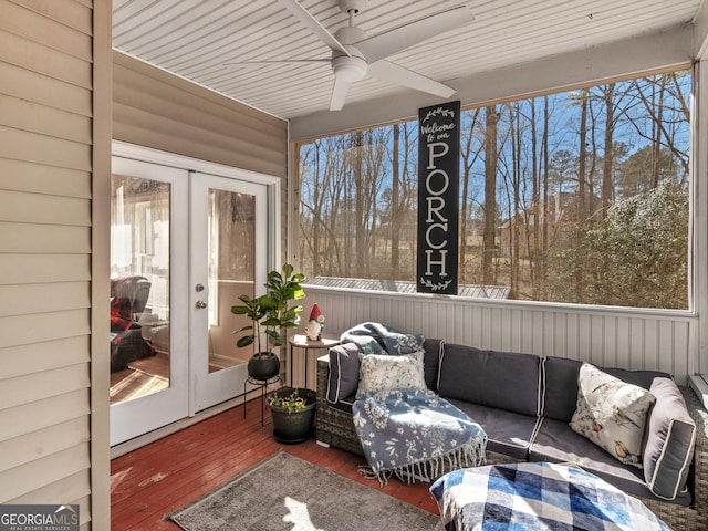 sunroom with french doors and a ceiling fan