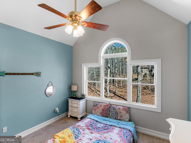 unfurnished bedroom with lofted ceiling, light colored carpet, ceiling fan, and a closet