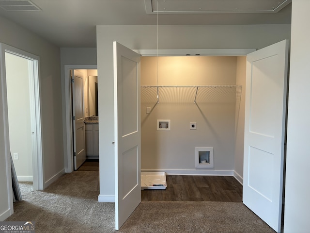 laundry room with hookup for an electric dryer, hookup for a washing machine, and dark colored carpet