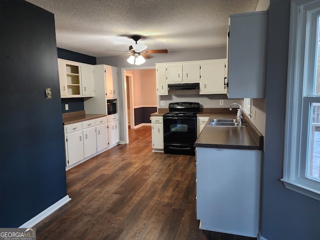 kitchen with black appliances, white cabinets, sink, a textured ceiling, and dark hardwood / wood-style flooring