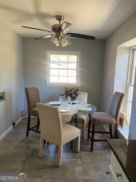 dining room with ceiling fan