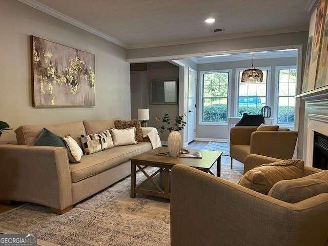 living room featuring ornamental molding