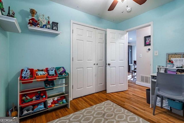 home office with ceiling fan and wood-type flooring