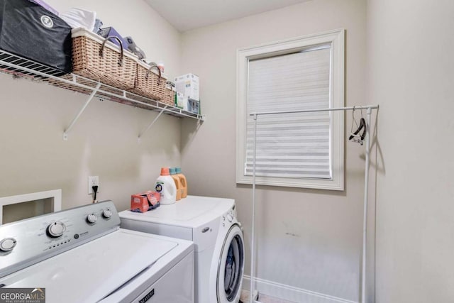 washroom with separate washer and dryer