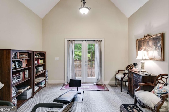 workout area with carpet flooring, high vaulted ceiling, and french doors