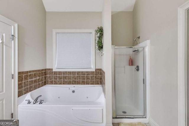 bathroom featuring plus walk in shower