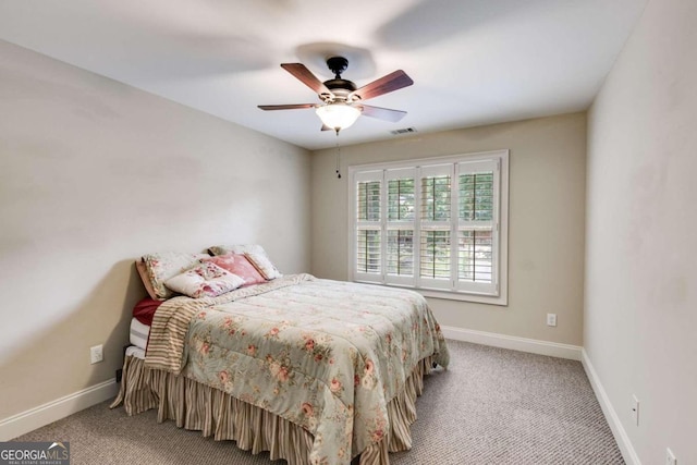 carpeted bedroom featuring ceiling fan