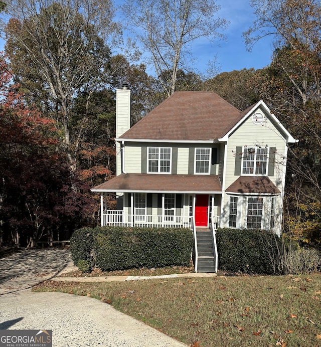 view of property featuring a porch