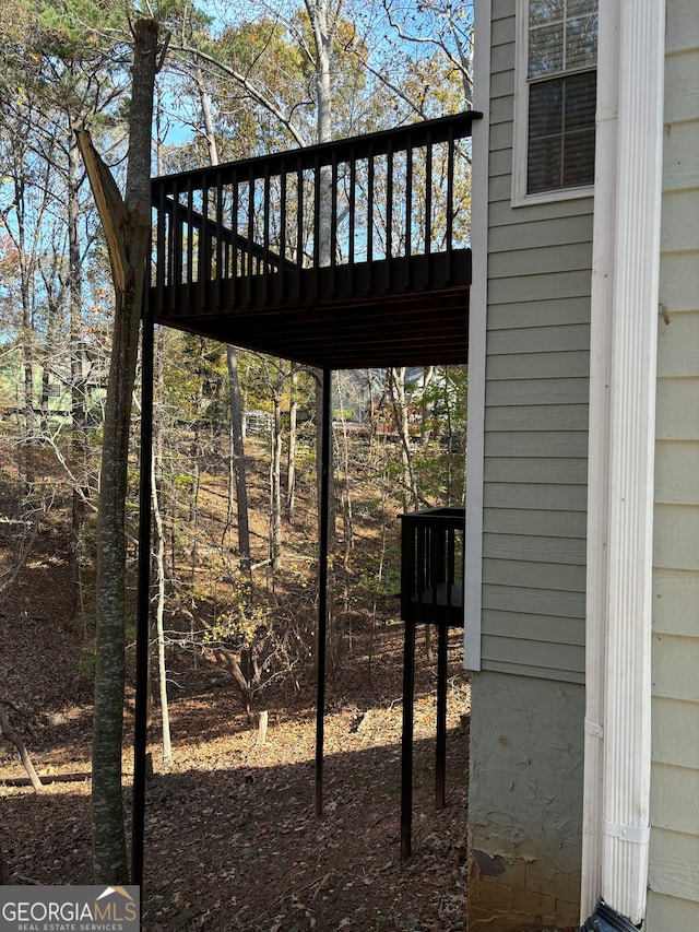 exterior space featuring a wooden deck