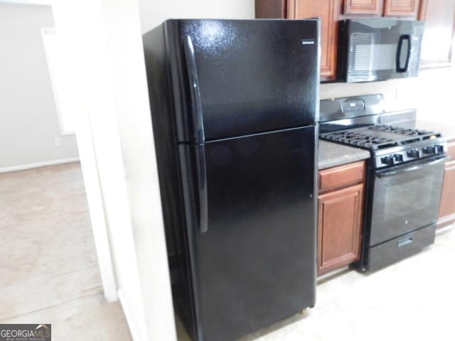 kitchen featuring black appliances