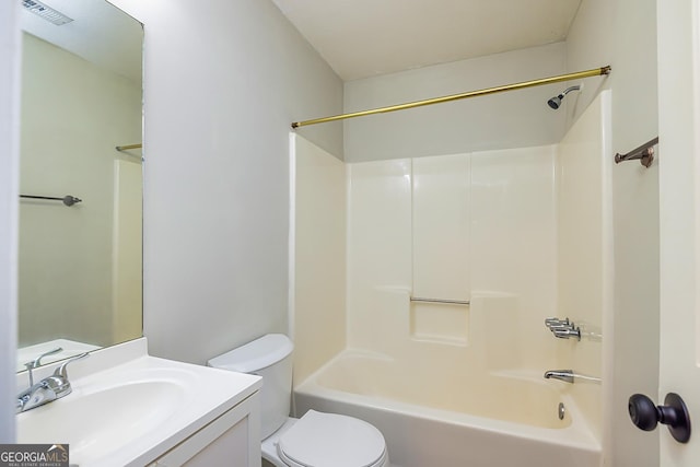 full bathroom with vanity, toilet, and  shower combination