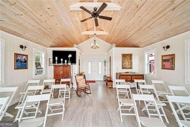 dining space featuring ceiling fan with notable chandelier, light hardwood / wood-style floors, lofted ceiling, and wood ceiling